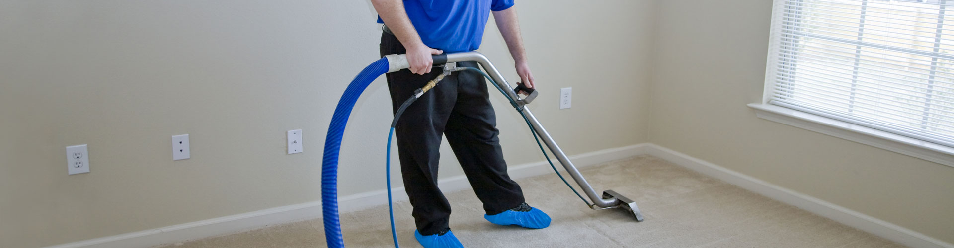 Worker Working on Carpet Cleaning